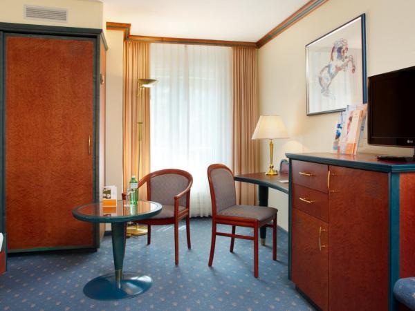 Thermal Hotels & Walliser Alpentherme Leukerbad : photo 2 de la chambre chambre simple deluxe grand bain