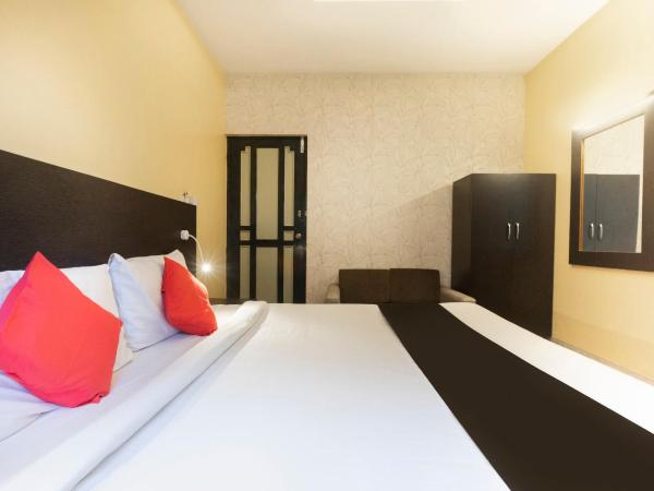 Collection O Santhome Residency Near Marina Beach : photo 9 de la chambre chambre double standard