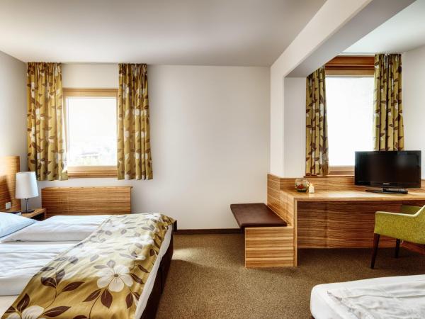 Alphotel Innsbruck : photo 1 de la chambre chambre triple avec place de parking
