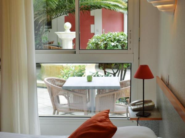 Hôtel Orange Marine : photo 1 de la chambre chambre double côté patio