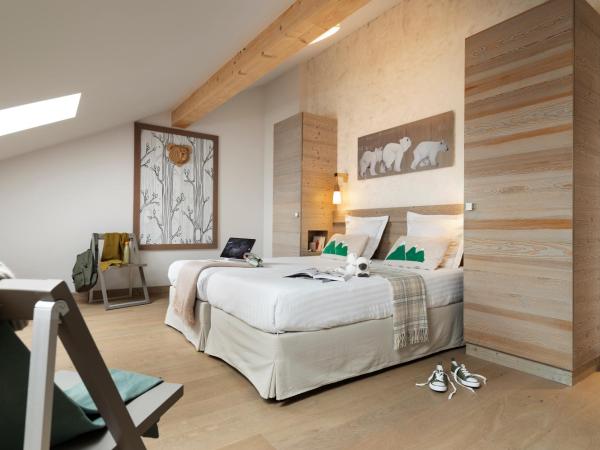 Résidence Pierre & Vacances Premium L'Hévana : photo 8 de la chambre appartement 3 chambres avec cheminée et sauna (8 personnes)