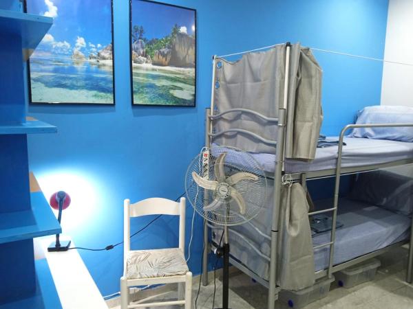 Casa Amari alla Zisa HOSTEL : photo 1 de la chambre lit superposé dans dortoir pour femmes 