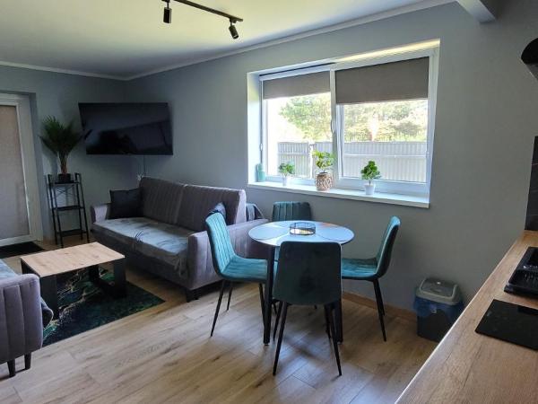 BŁĘKITNA 37 apartamenty : photo 3 de la chambre chambre quadruple avec salle de bains privative