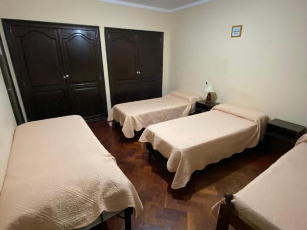 COYA HOSTEL : photo 7 de la chambre chambre quadruple avec salle de bains commune