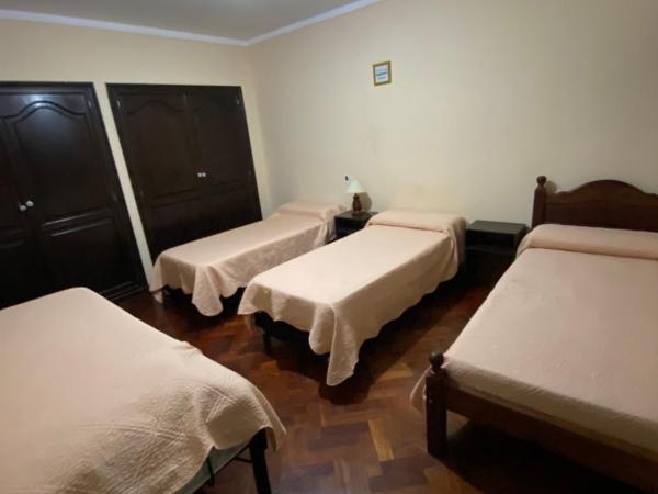 COYA HOSTEL : photo 8 de la chambre chambre quadruple avec salle de bains commune