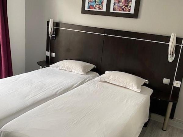 Hôtel Le Home Saint Louis : photo 1 de la chambre chambre lits jumeaux