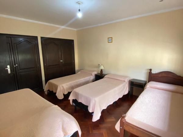 COYA HOSTEL : photo 9 de la chambre chambre quadruple avec salle de bains commune