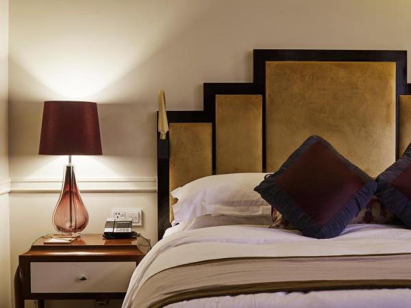 Jinjiang Metropolo Hotel Classiq,Shanghai Bund Circle : photo 2 de la chambre chambre double ou lits jumeaux extreme sassy