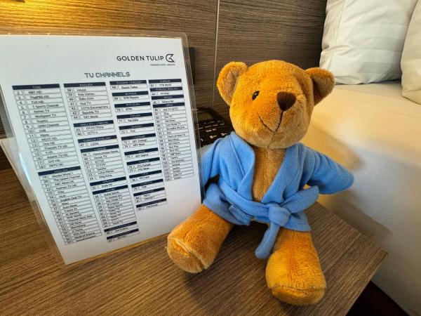 Golden Tulip Mandison Suites : photo 8 de la chambre suite lit king-size familiale