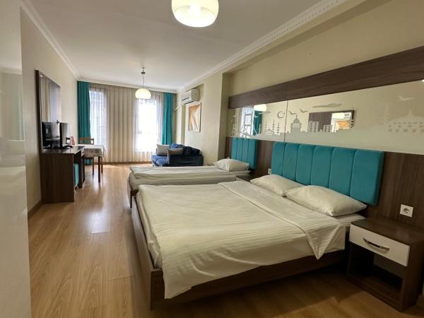 Kupeli Hotel : photo 3 de la chambre chambre quadruple de luxe - annexe