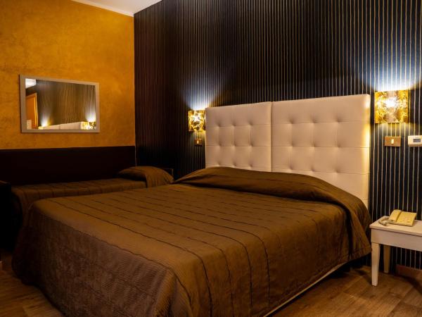 Hotel Il Guercino : photo 4 de la chambre chambre triple