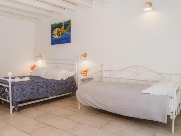 Boutique Hotel Molo S Lucia : photo 1 de la chambre chambre double ou lits jumeaux avec lit d'appoint
