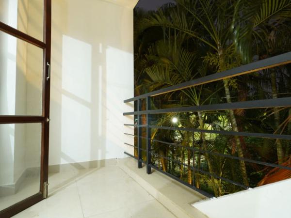 Local NR Green Woods : photo 3 de la chambre chambre double ou lits jumeaux