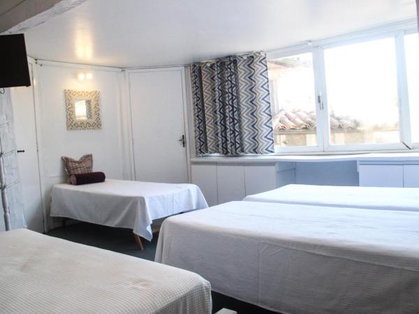 Pousada Blanca Inn : photo 2 de la chambre chambre quadruple - vue sur jardin