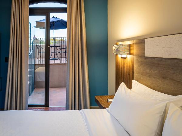 Holiday Inn Express Morelia Centro Historico : photo 4 de la chambre chambre standard lit king-size avec balcon - vue sur ville