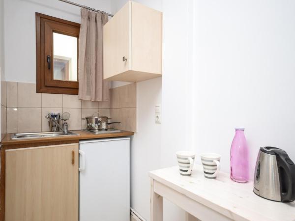 Panormos Hotel and Studios : photo 9 de la chambre chambre familiale deluxe - vue sur mer