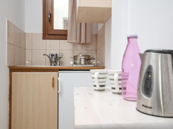 Panormos Hotel and Studios : photo 7 de la chambre chambre familiale deluxe - vue sur mer