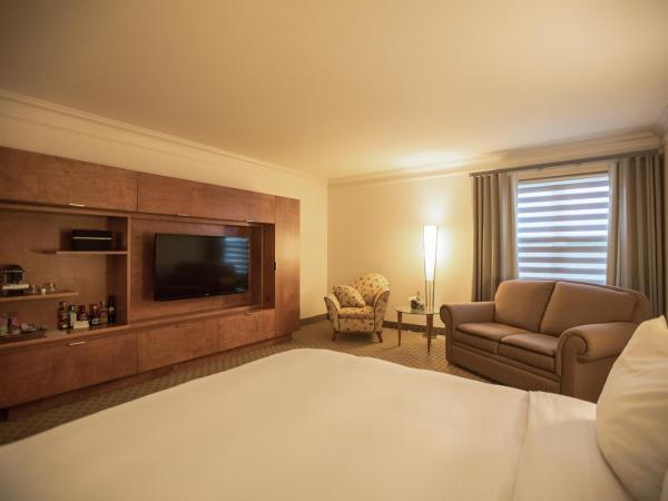 Hôtel Le Bonne Entente : photo 2 de la chambre hébergement lit queen-size distinctive