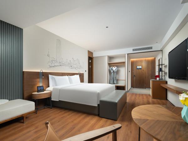 UrCove by Hyatt Tianjin West Railway STN : photo 1 de la chambre chambre lit queen-size deluxe