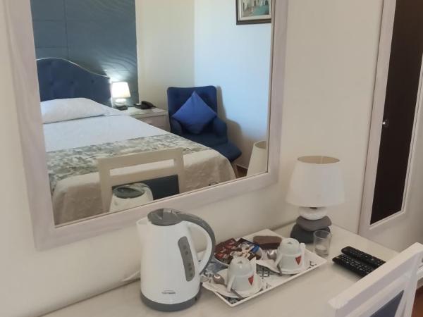 Aeromar Beach Hotel : photo 1 de la chambre chambre lits jumeaux supérieure avec balcon - vue sur mer ou rivière