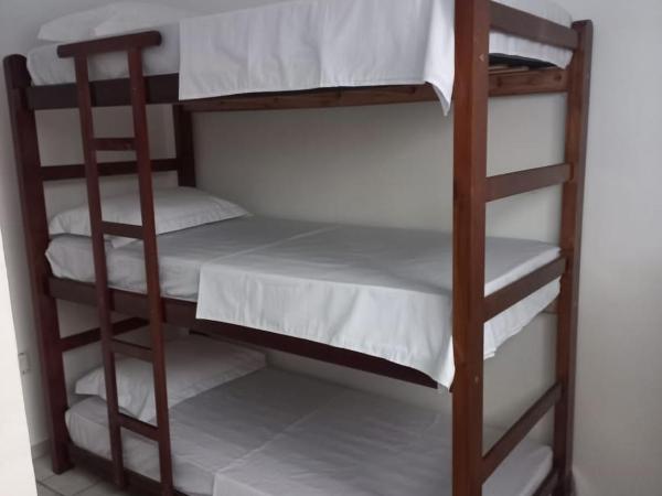 FlordÁfrica espaço de convivência e hospedagem : photo 1 de la chambre lits superposés dans dortoir masculin