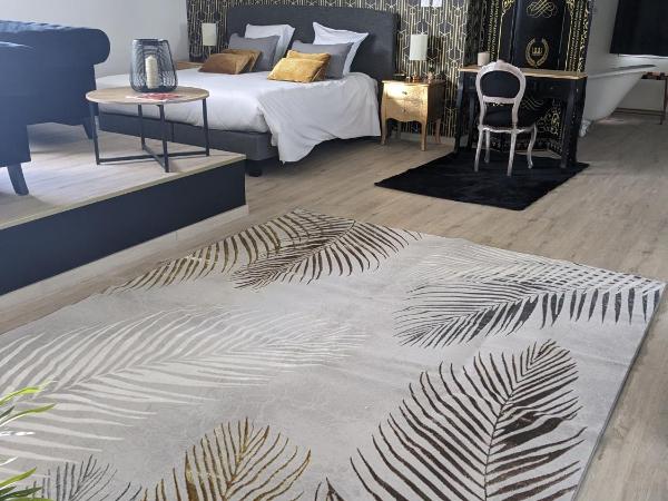 Le Domaine de La Tour des Vents : photo 1 de la chambre chambre deluxe