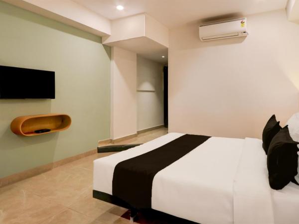 Townhouse 1357 Hotel Lotus Grand : photo 5 de la chambre chambre triple classique