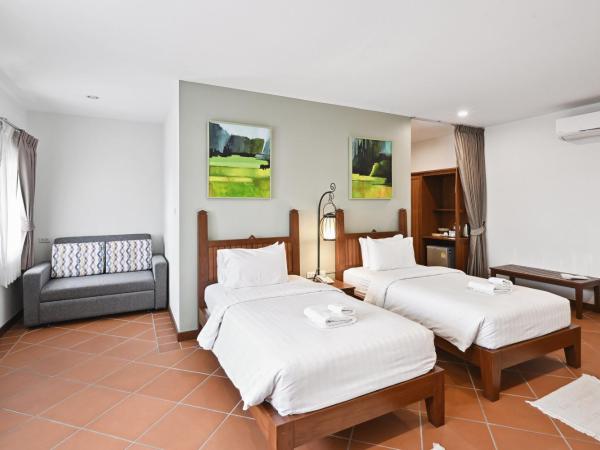 Villa Sanpakoi : photo 4 de la chambre chambre lits jumeaux - vue sur ville