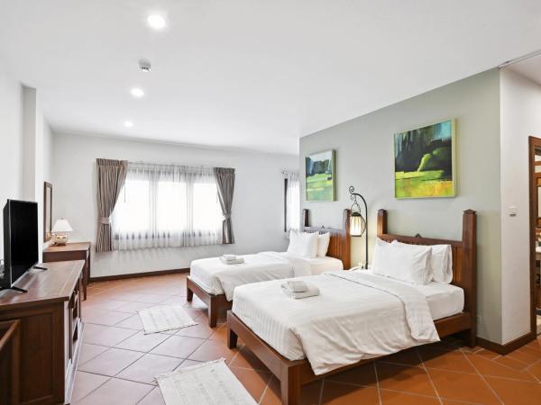 Villa Sanpakoi : photo 2 de la chambre chambre lits jumeaux - vue sur ville