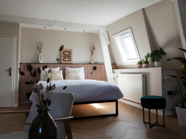 Stadsherberg de Poshoorn : photo 1 de la chambre chambre familiale deluxe