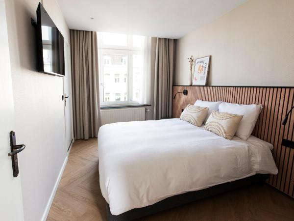 Stadsherberg de Poshoorn : photo 3 de la chambre chambre double standard