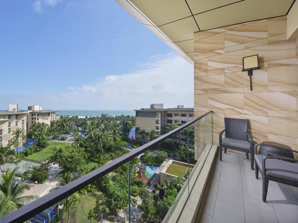 Wanda Realm Resort Sanya Haitang Bay : photo 3 de la chambre chambre lit king-size de luxe - vue sur océan
