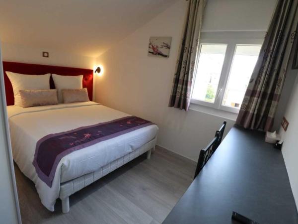 Le Lotus Blanc : photo 2 de la chambre chambre double supérieure