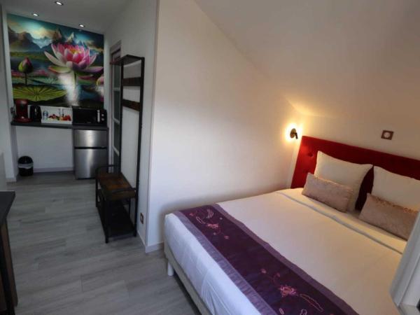 Le Lotus Blanc : photo 3 de la chambre chambre double supérieure