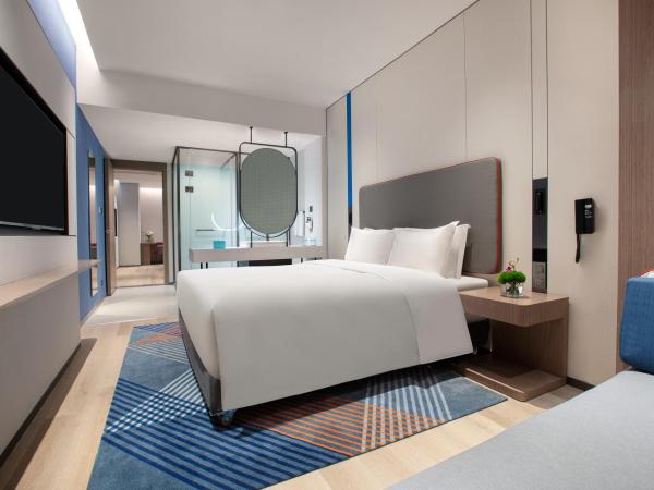 Holiday Inn Express Changfeng Park : photo 2 de la chambre 1 king and 1 double 2 bedroom suite