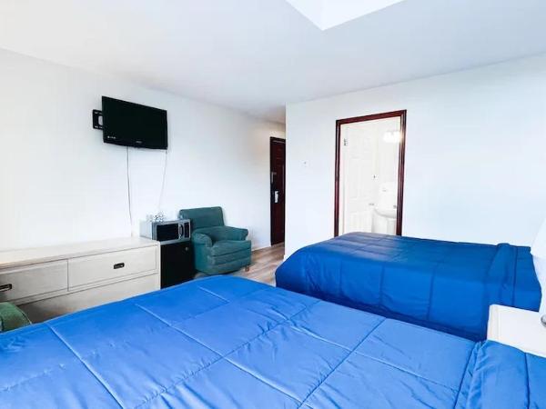 Commons Inn : photo 3 de la chambre chambre de luxe avec 2 lits doubles