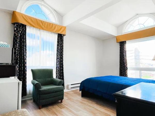 Commons Inn : photo 1 de la chambre chambre lit queen-size deluxe