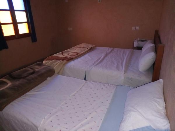 Dar Zara : photo 1 de la chambre chambre triple avec salle de bains