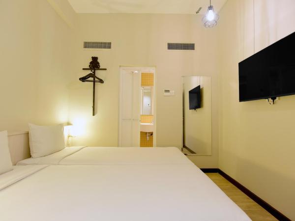 Cititel Express Kota Kinabalu : photo 2 de la chambre chambre lits jumeaux standard - sans fenêtre