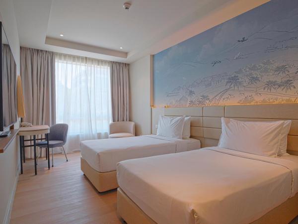 Cititel Express Kota Kinabalu : photo 1 de la chambre chambre lits jumeaux supérieure