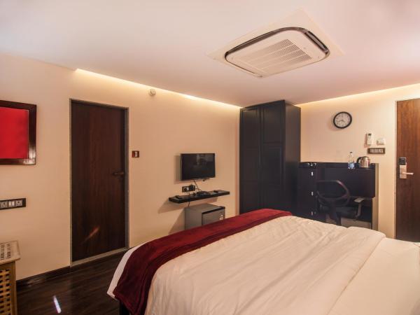 The V Sadan : photo 4 de la chambre chambre lit king-size