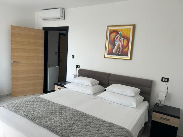 VILLA JANE INN : photo 10 de la chambre chambre double ou lits jumeaux deluxe avec balcon - vue sur mer