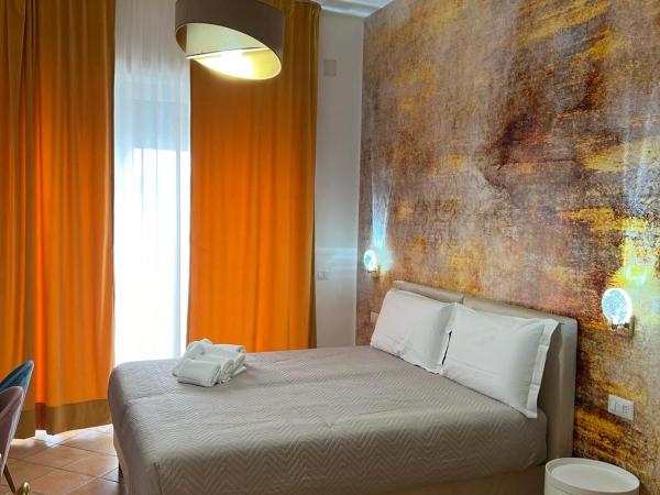 Le Corti del Re : photo 1 de la chambre chambre double ou lits jumeaux deluxe - vue sur ville