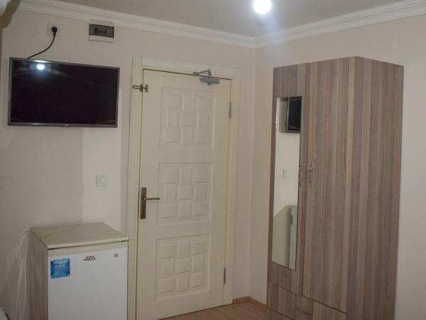 Kümbet Hotel : photo 9 de la chambre chambre familiale avec salle de bains privative