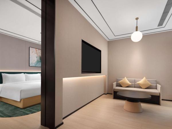 Hilton Garden Inn Chengdu Chunxi Road Center : photo 2 de la chambre suite deluxe avec lit king-size
