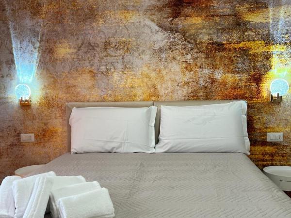 Le Corti del Re : photo 2 de la chambre chambre double ou lits jumeaux deluxe - vue sur ville