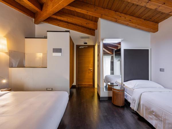 Best Western Plus Hotel De Capuleti : photo 1 de la chambre chambre triple