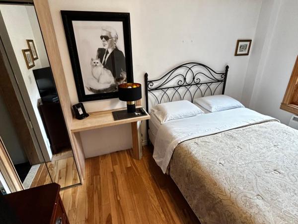 Gite Le Sieur de Joliette : photo 4 de la chambre chambre queen-size avec baignoire spa (nolan)