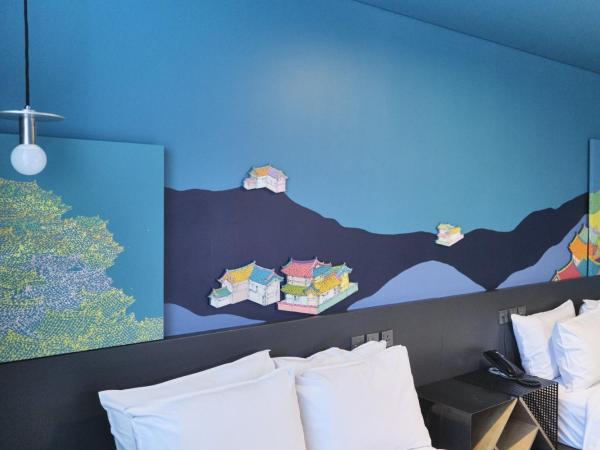 Hotel Cappuccino : photo 5 de la chambre chambre deluxe avec 2 lits queen-size