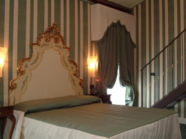 Hotel Belle Epoque : photo 1 de la chambre chambre quadruple